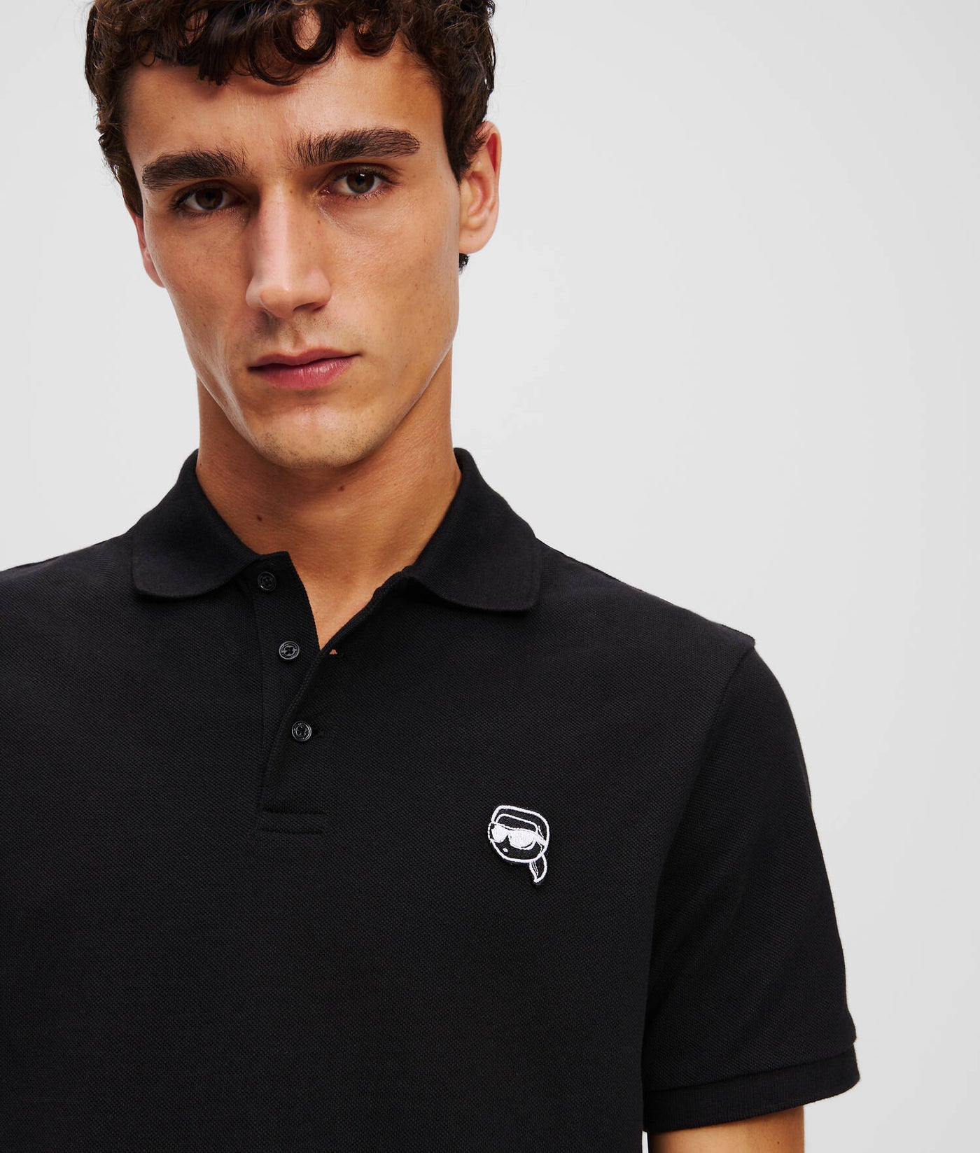 Karl Lagerfeld Ikon Embroidered Patch Golfer: Black Polo Shirt for Men