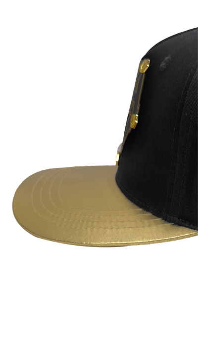 Vialli Golden Cap Black Gold Two-Tone Design with Hexagons and Snap Closure